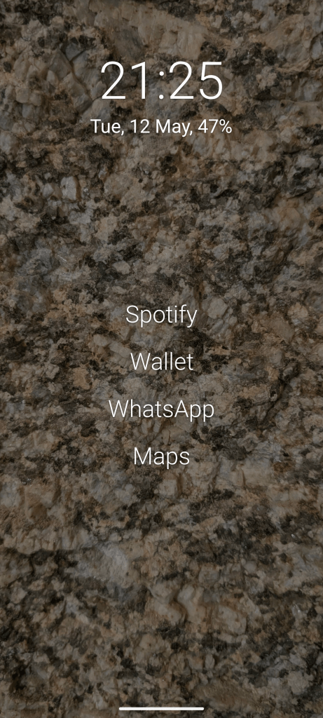 Ecrã de telemóvel com 4 apps: spotify, Wallet, WhatsApp e Maps